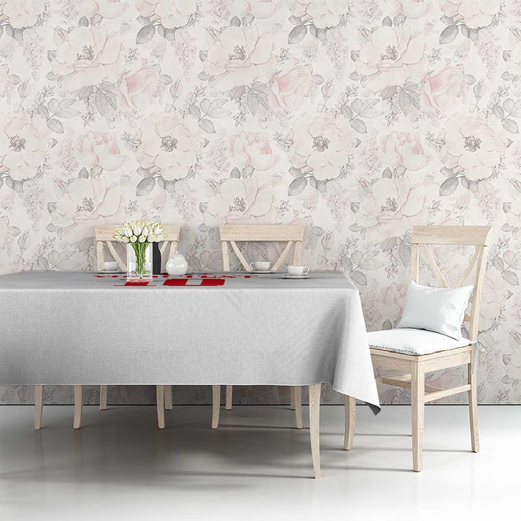 White tablecloth on dining table with red emblem center print