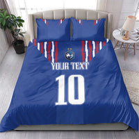 Blue bedding set on bed with duvet and two pillows, France stripes, Your Text 10