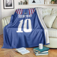 Blue football blanket with red-white stripes, crest, “YOUR TEXT” and number 10 with drape