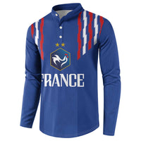 Blue football button sweatshirt with crest and partial FRANCE print, striped shoulder panels