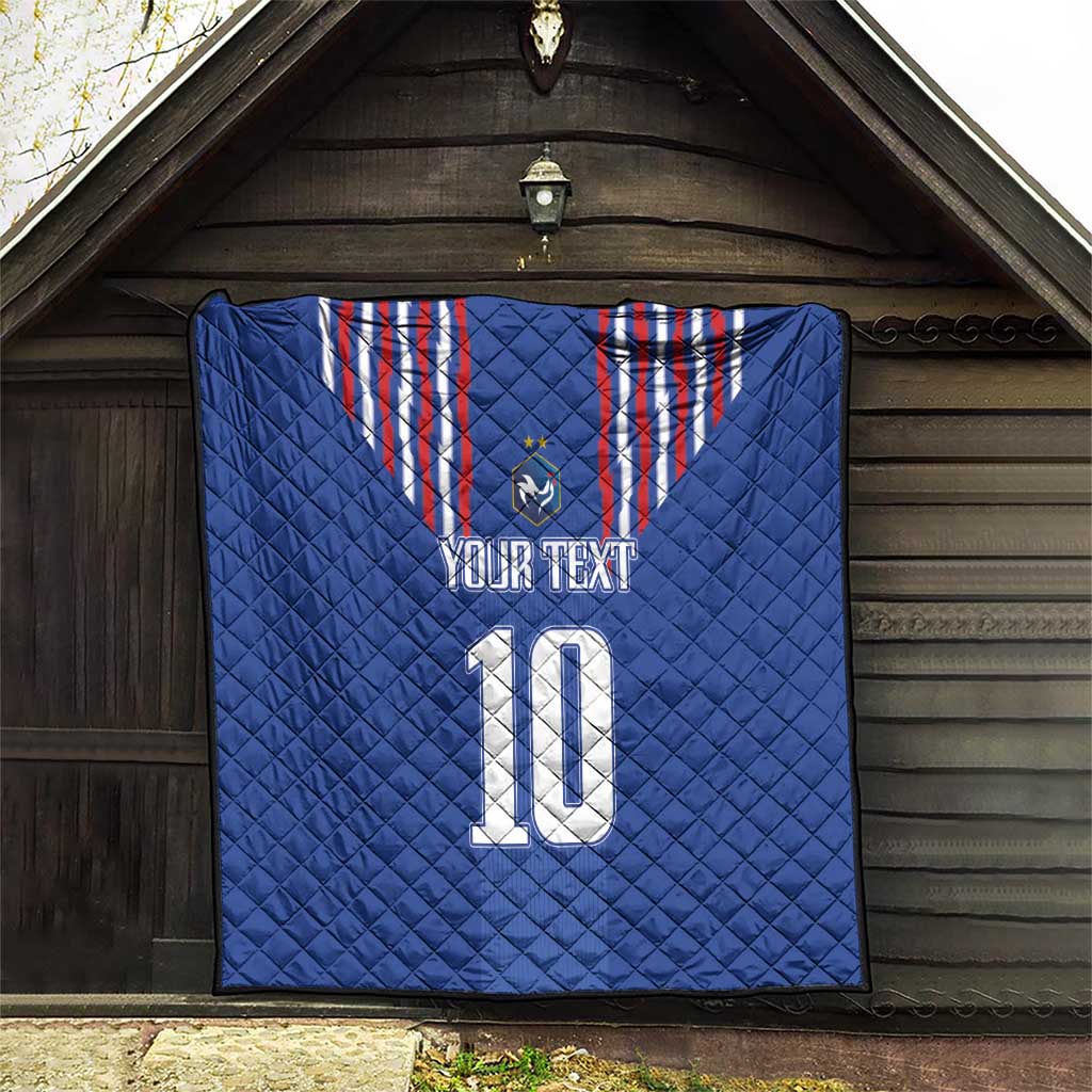 Blue quilt blanket with red-and-white striped crest, shield emblem, “YOUR TEXT” and number 10