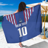 Blue football-style sarong with red/white stripe panel, number 10 and logo print