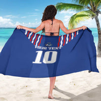 Blue football-style sarong with number 10 and red/white stripe panel, wrap view
