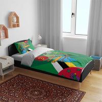 Green Dominica Independence Day duvet on bed with matching pillowcases, parrot and map