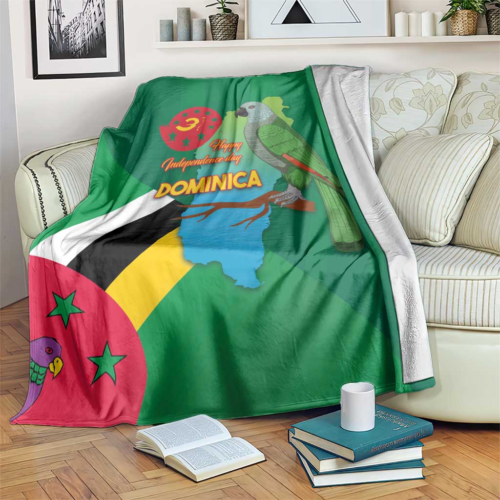 Green Dominica independence blanket with national flag design and map, draped on sofa