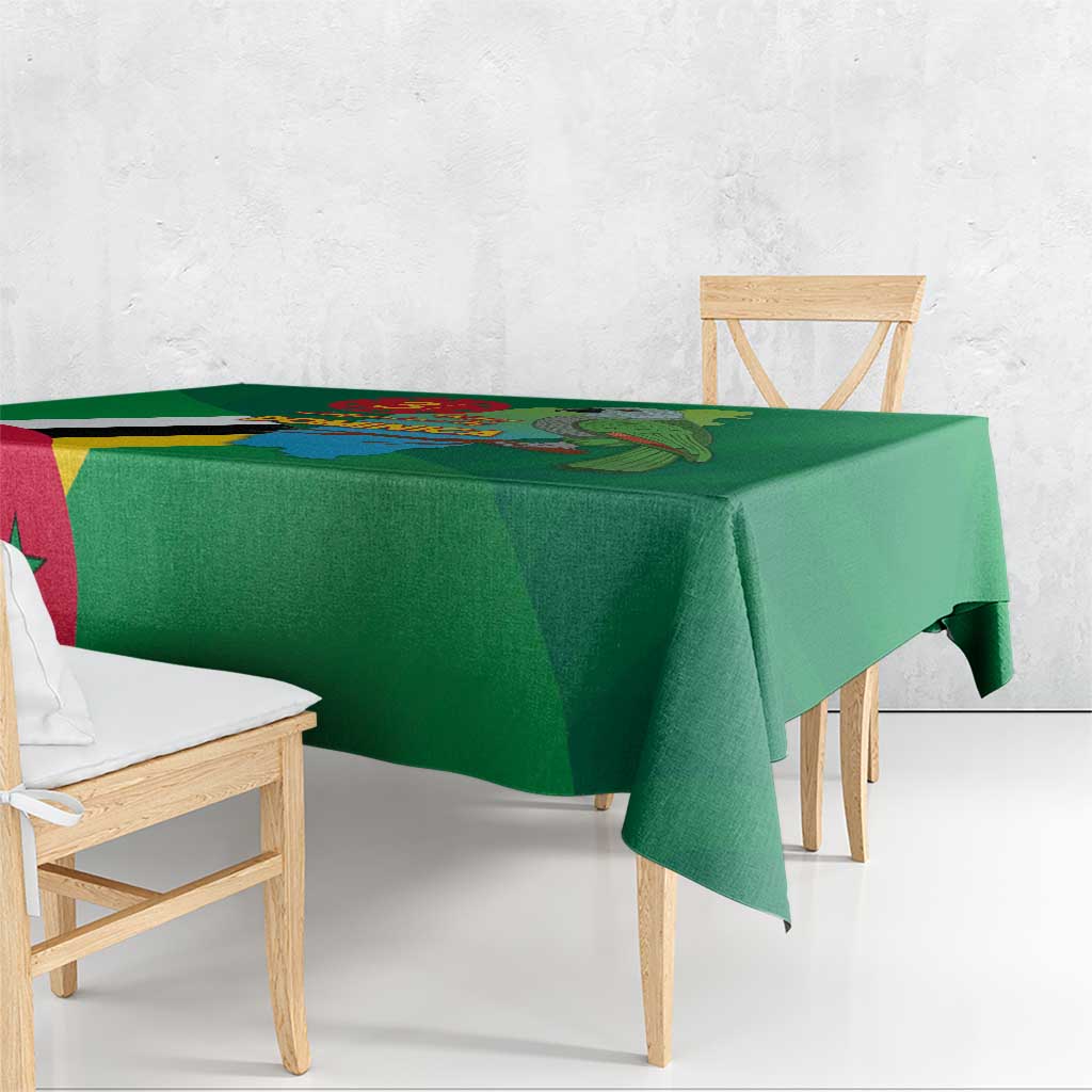 Green Independence Day tablecloth draped over wooden dining table
