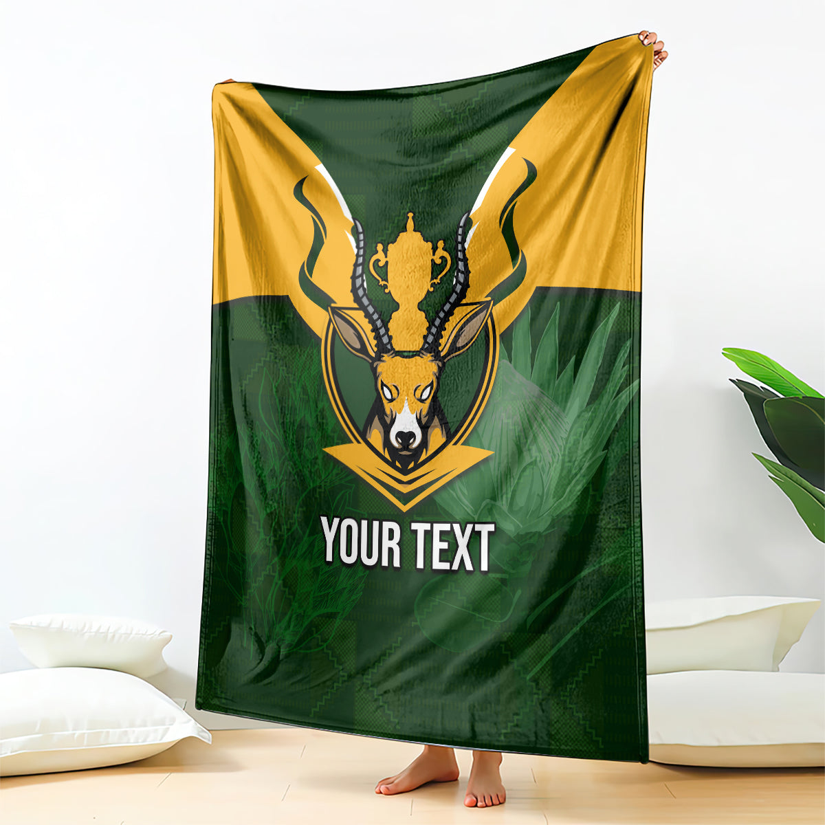 Personalised rugby blanket in green with yellow Springbok mascot crest and “YOUR TEXT”