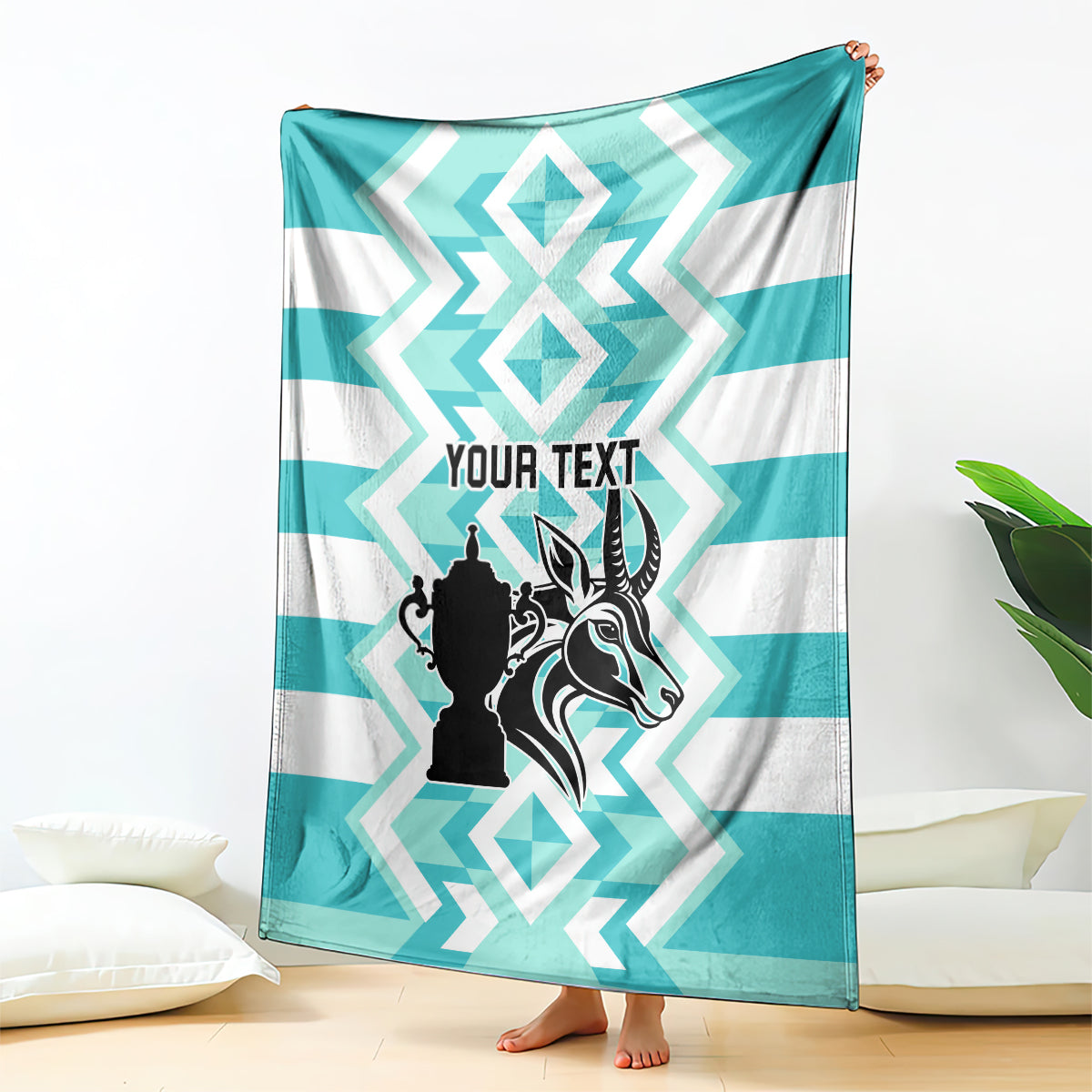 Personalized rugby blanket with teal and white chevron stripes, black emblem, custom text