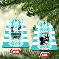 Blue ceramic rugby ornament, bell shape with gold string; front shows Champion 2023.