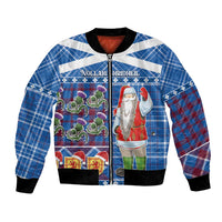 Unisex blue plaid bomber jacket with Santa Claus graphic, zip front and ribbed cuffs.