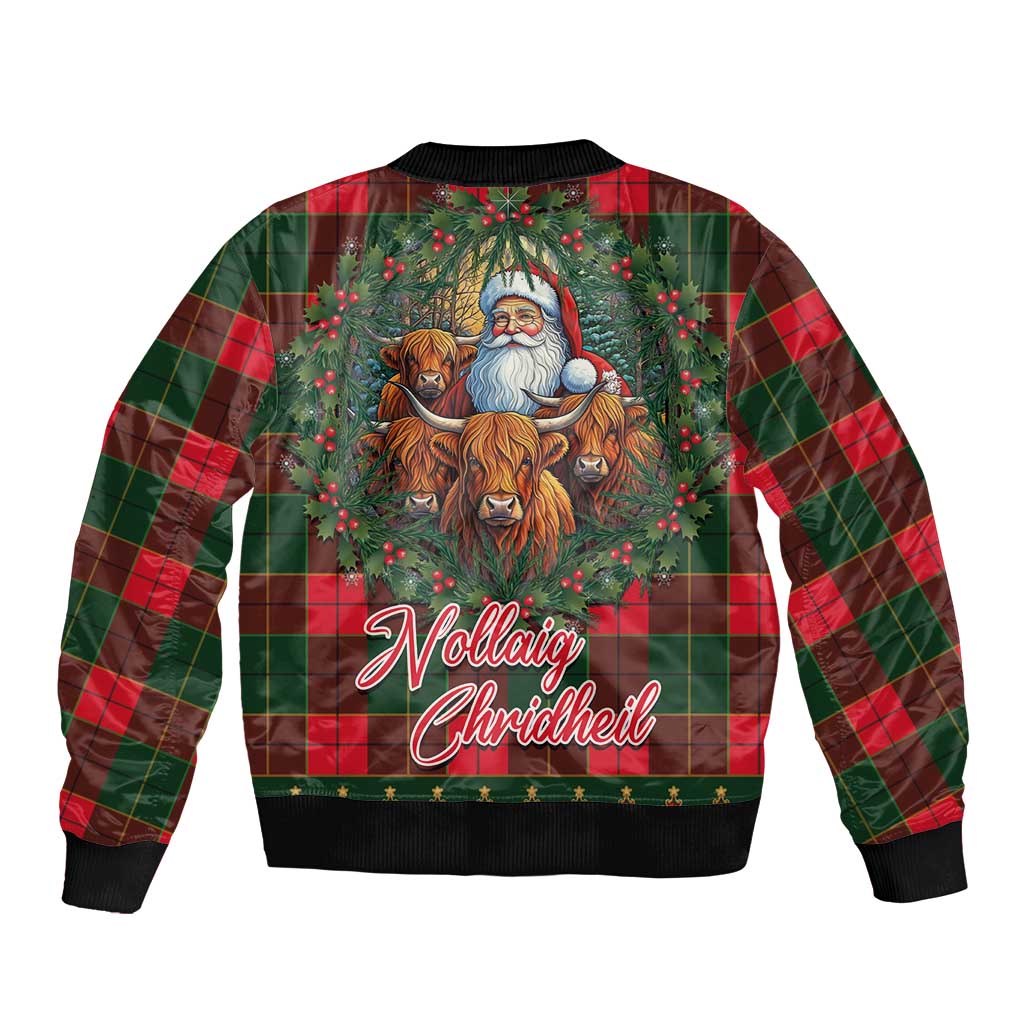 Back of red/green tartan bomber jacket with Santa and cows graphic, ribbed hem
