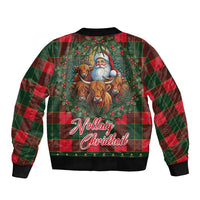 Back of red/green tartan bomber jacket with Santa and cows graphic, ribbed hem