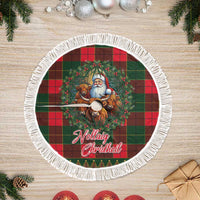 Circular red and green tartan tree skirt featuring Santa and cows center medallion, white fringe
