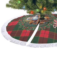 Red and green tartan circular tree skirt with Santa and cows print, white fringe edge