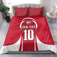 Red football bedding set with red/white jersey graphic and two matching striped pillowcases