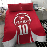Red football bedding set with jersey-style '10' graphic and two red striped pillowcases