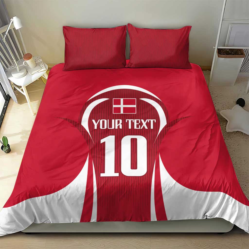 Red football bedding set with jersey-style '10' graphic comforter and two matching pillows