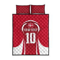 Red quilt bed set showing 'Your Text' and large white '10' jersey on duvet with two pillows