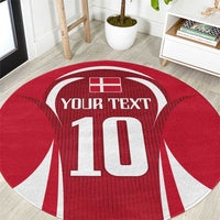 Red round football carpet close-up with white Your Text and 10 emblem