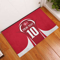 Red rubber doormat with circular logo, 'YOUR TEXT', and number 10 graphic