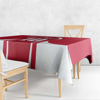 Red and white tablecloth with football jersey-style graphic and bold stripe pattern