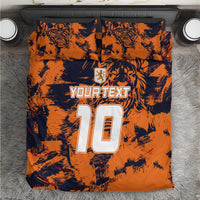 Orange tiger-print duvet cover featuring “YOURTEXT” and large “10” with crest