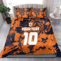 Orange tiger-print bedding set with two pillowcases and duvet showing “YOURTEXT” “10”