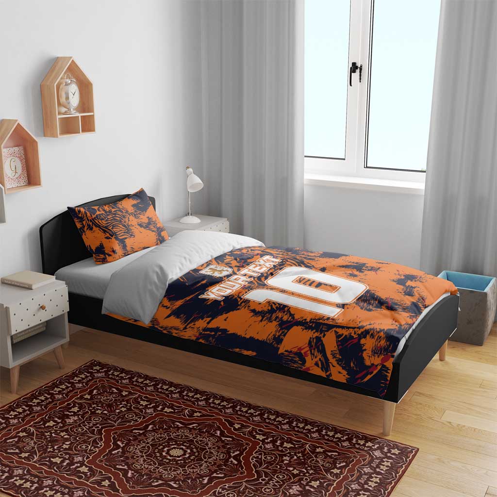 Orange tiger-print bedding set with “YOURTEXT” and large “10” on duvet and pillows