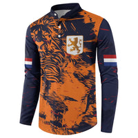 Orange and navy button-front football sweatshirt with lion graphic and shield crest