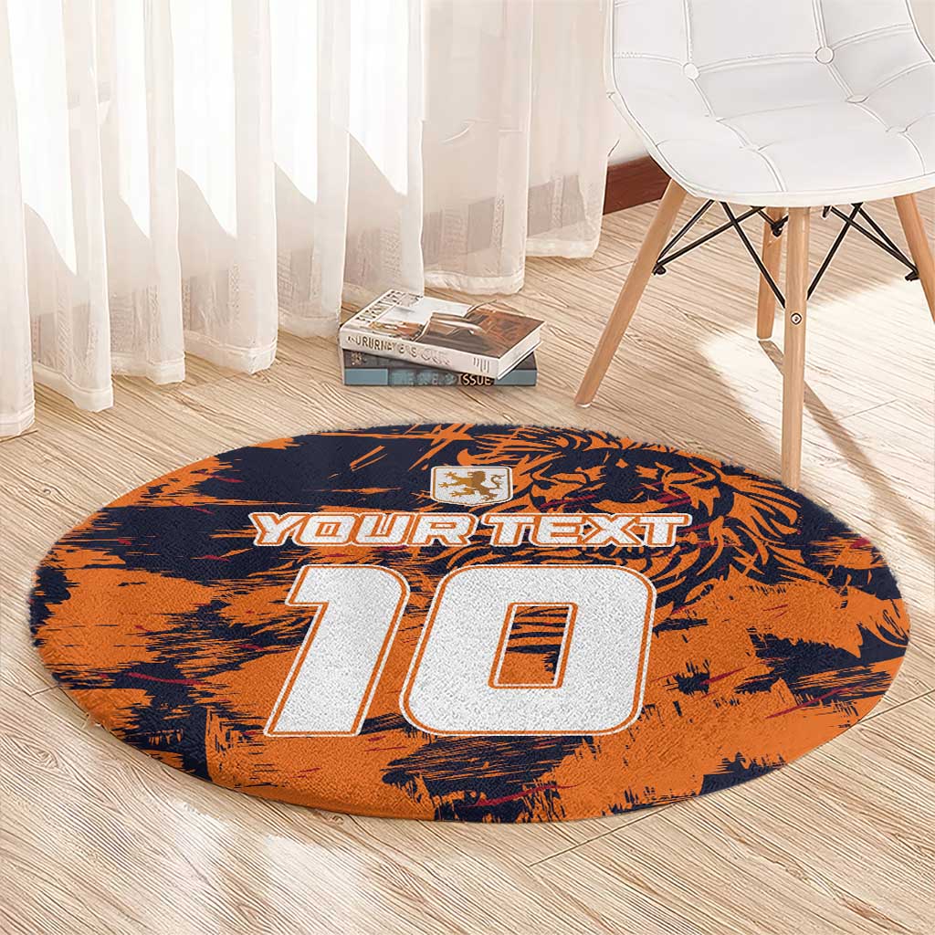 Orange round carpet with navy graphic and large '10' with 'YOUR TEXT' banner