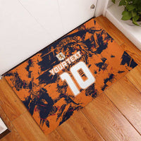 Orange rubber doormat with tiger and large '10' graphic on entry floor