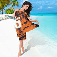 Orange football sarong with black splash pattern and white number 8 front graphic