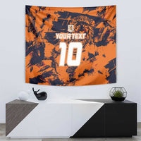 Orange sports tapestry featuring lion crest, YOURTEXT, and jersey number 10 design