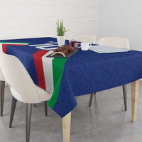Blue tablecloth with Italian flag stripes in red, white, and green
