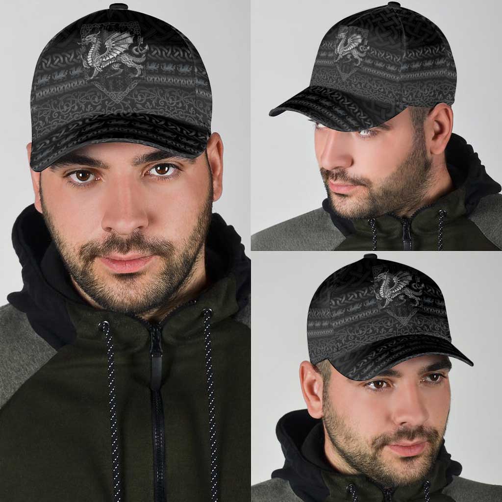 Black dragon crest cap worn by man, front and side views with hood