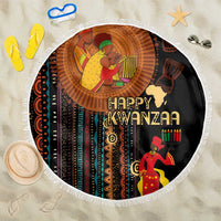 Round beach blanket in black with “Happy Kwanzaa” African tribal graphic and fringe