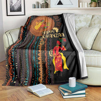 Black African tribal pattern blanket with “Happy Kwanzaa” text and colorful figures