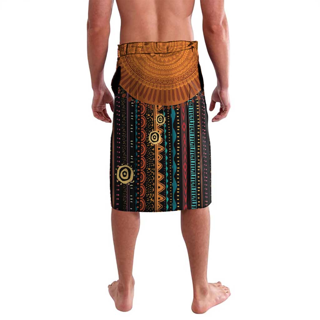 Black wrap skirt with African print and circular Kwanzaa graphic, back view