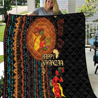 Black quilt with African tribal striping, Happy Kwanzaa figures, and diamond quilting