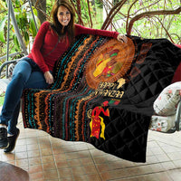 Black quilt with colorful African striping and Happy Kwanzaa figures, diamond quilting