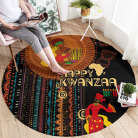 Round area rug with Happy Kwanzaa graphic, black background and colorful tribal pattern stripes.