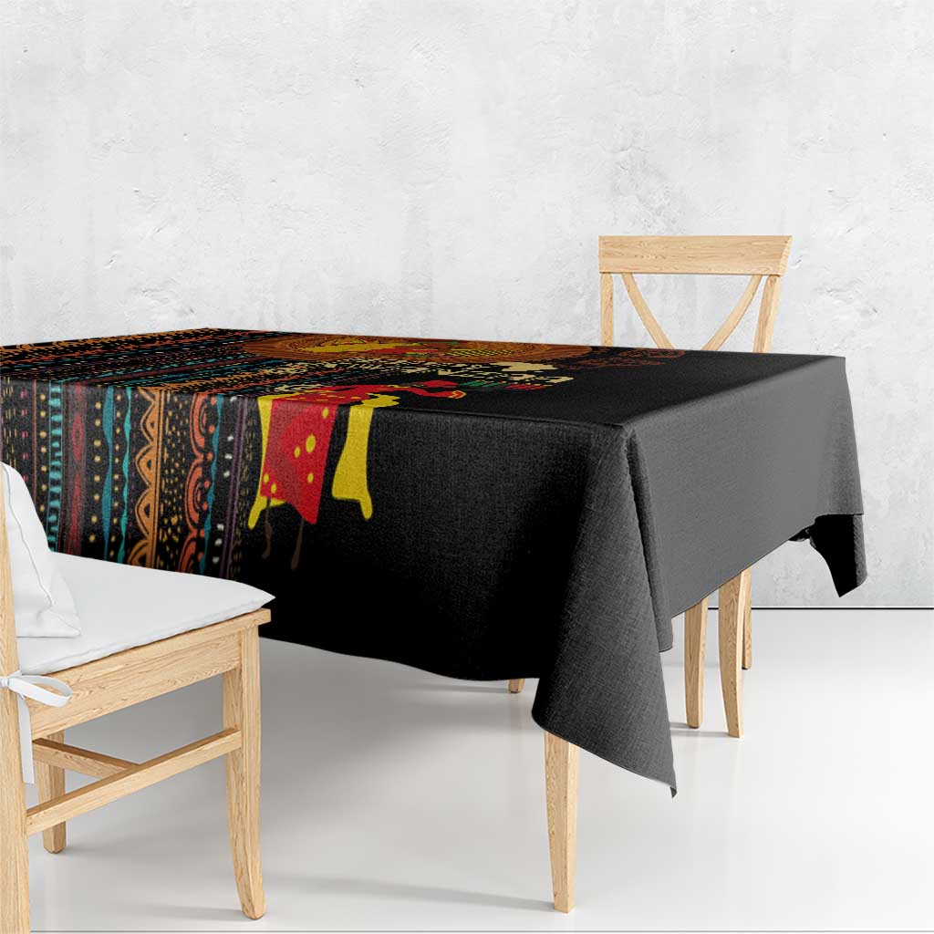 Black tablecloth with colorful African tribal striping along the edge
