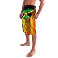 Reggae print lavalava wrap skirt with green gold red panel and stylized portrait