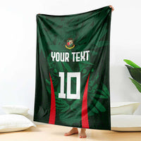 Green cricket blanket draped to show 'YOUR TEXT' and number 10 with red side stripes