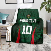 Green cricket blanket on chair seat with 'YOUR TEXT' and red side stripes, number 10