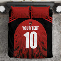 Red and black football bedding set with 'YOUR TEXT', number 10, and team crest on duvet