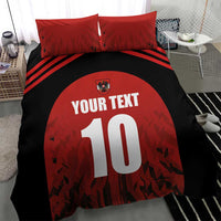 Red and black football duvet cover with 'YOUR TEXT', large 10, crest, and two pillows