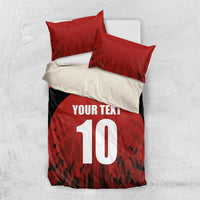 Red and black duvet cover set with 'YOUR TEXT' and number 10, with two matching red pillows