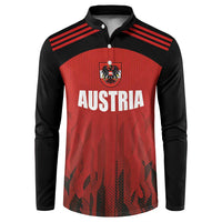 Red and black Austria football button sweatshirt, front crest, striped shoulders.