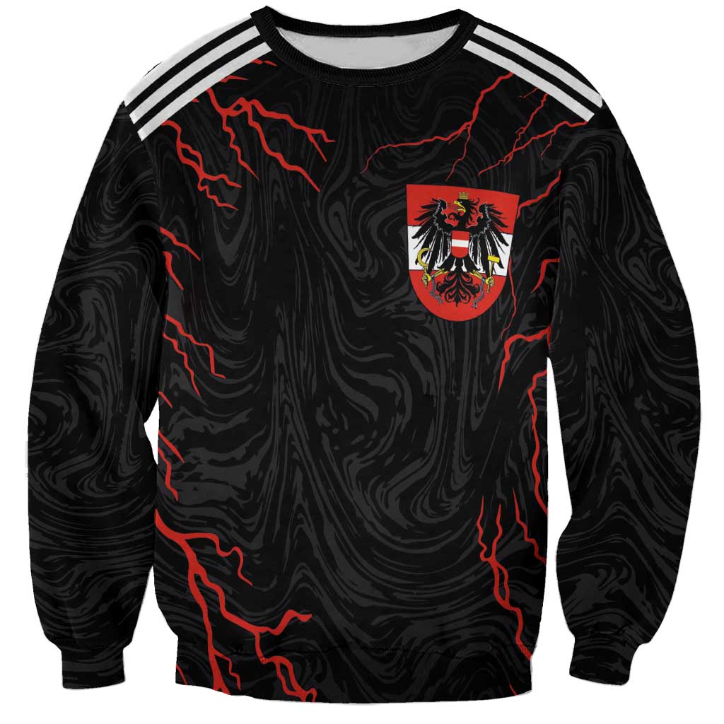 Black crewneck sweatshirt with red electric map graphic and Austria-style crest patch